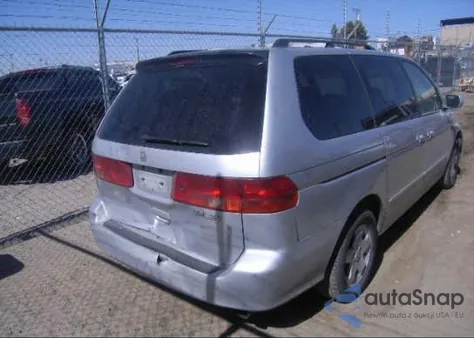 2001 Honda Odyssey Ex z USA, uszkodzony, nr VIN 2HKRL186X1H006342